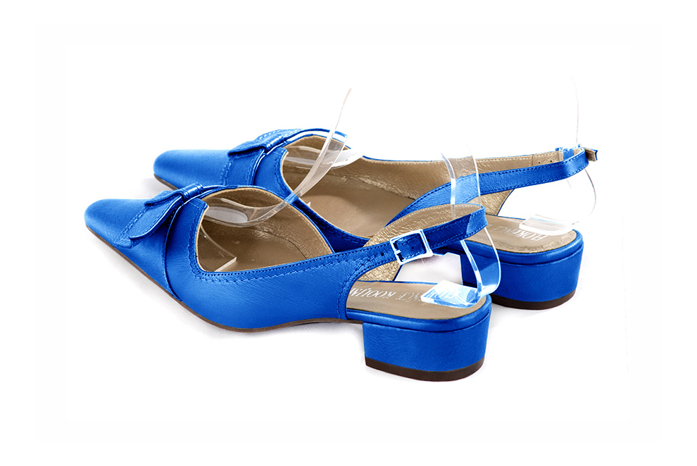 French elegance and refinement for these electric blue dress slingback shoes, with a knot, 
                available in many subtle leather and colour combinations. The pretty French spirit of this beautiful pump will accompany your steps nicely and comfortably.
To be personalized or not, with your materials and colors.  
                Matching clutches for parties, ceremonies and weddings.   
                You can customize these shoes to perfectly match your tastes or needs, and have a unique model.  
                Choice of leathers, colours, knots and heels. 
                Wide range of materials and shades carefully chosen.  
                Rich collection of flat, low, mid and high heels.  
                Small and large shoe sizes - Florence KOOIJMAN